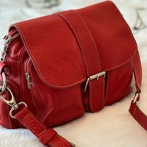 Cute Roots purse with shoulder strap.